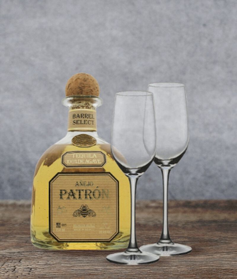 A gift set with a bottle of Patròn Añejo Single Barrel and two tequila flute glasses